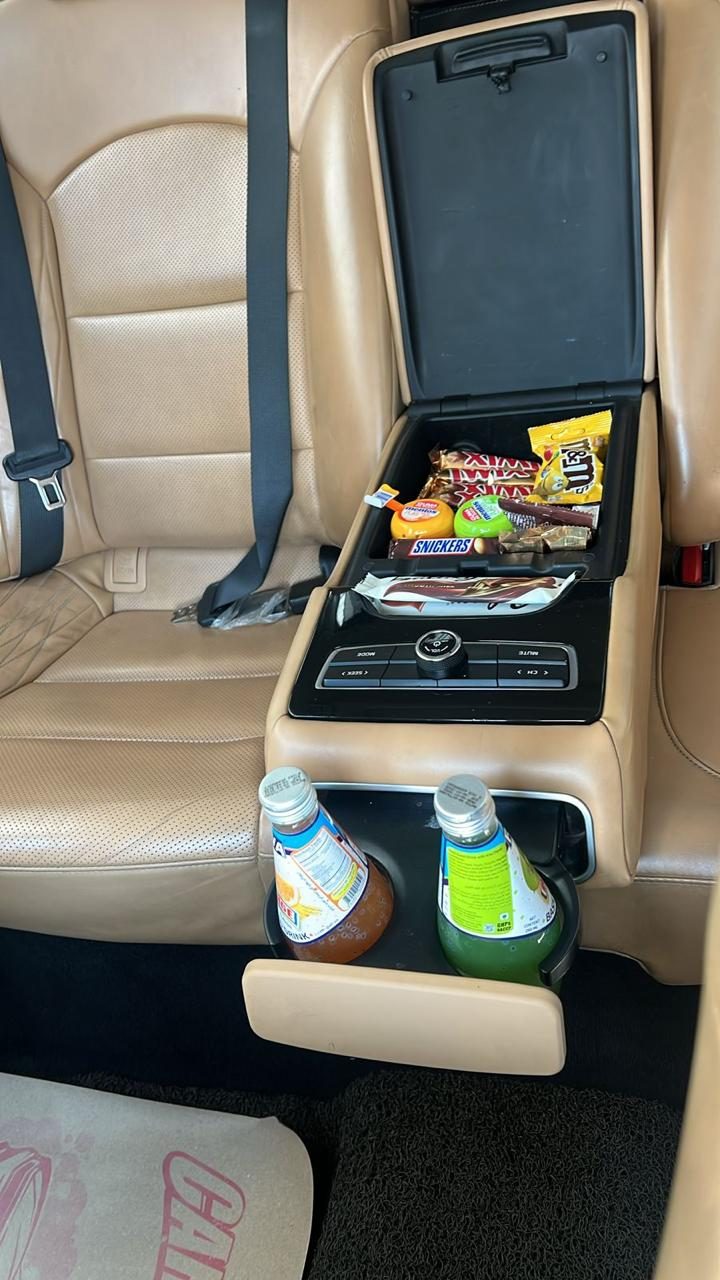 Complimentary refreshments and snacks inside the car